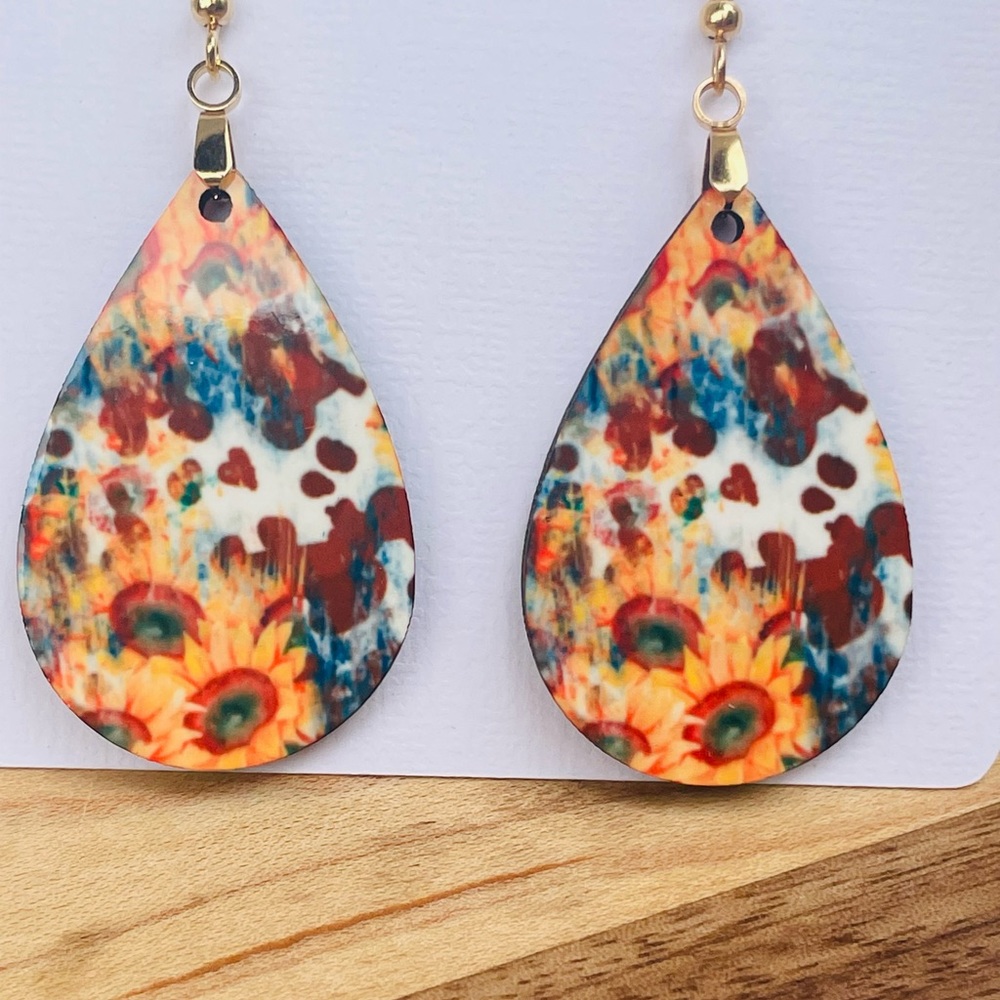 Western cowhide and sunflower dangles